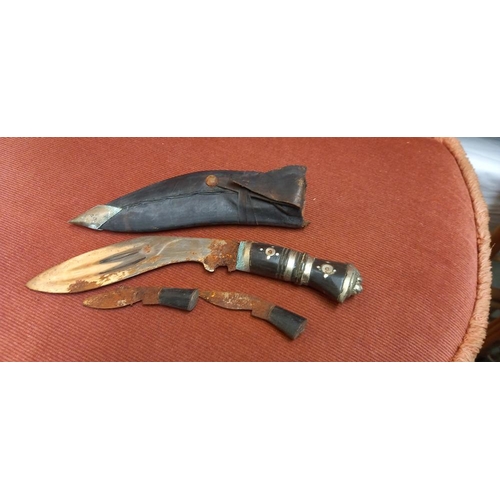 1586 - A quantity of miscellaneous including kukri and vintage skinning knife, brass trivet, playing cards ... 