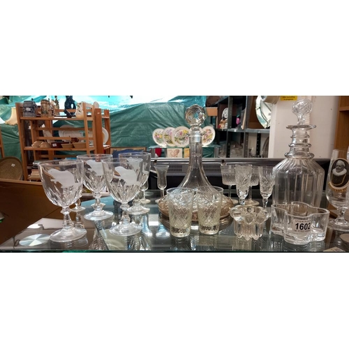 1602 - A quantity of glasses including 2 decanters etc. COLLECT ONLY