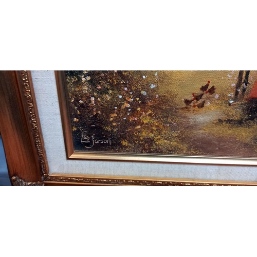 1604 - A gilt framed oil on canvas of a cottage, by Les Parson COLLECT ONLY