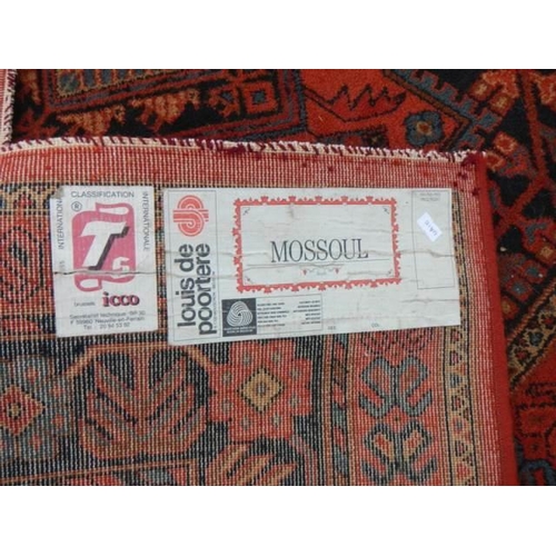 534 - A good red patterned rug, 96 x 67 inches, COLLECT ONLY.