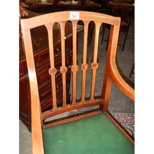 567 - An early 20th century mahogany inlaid elbow chair, COLLECT ONLY.