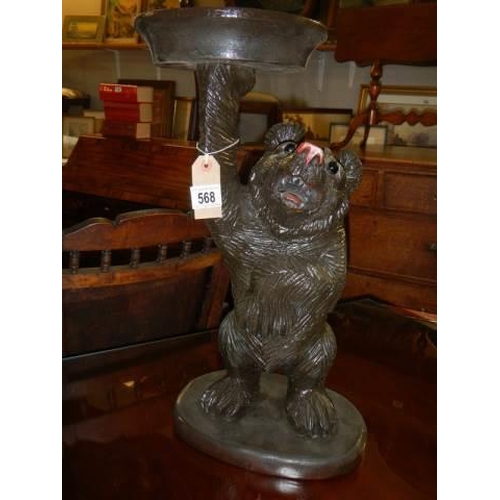 568 - A large carved wood  Black Forest bear plant stand, 53cm., COLLECT ONLY.