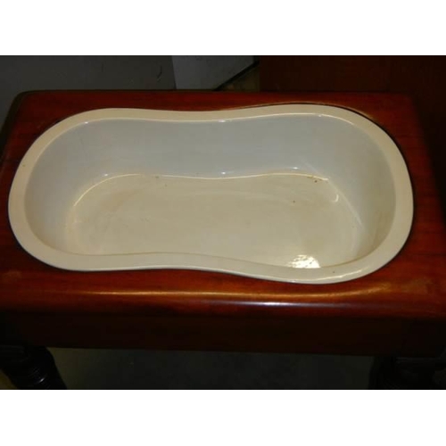 604 - An early 20th century French baby bath complete with liner. COLLECT ONLY.