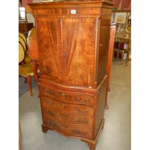 615 - A mid 20th century drinks cabinet with imitation drawer front to base. COLLECT ONLY.