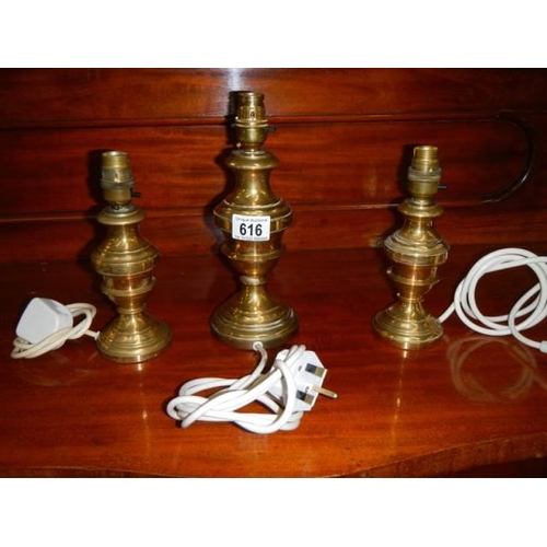 616 - Three brass table lamp bases.