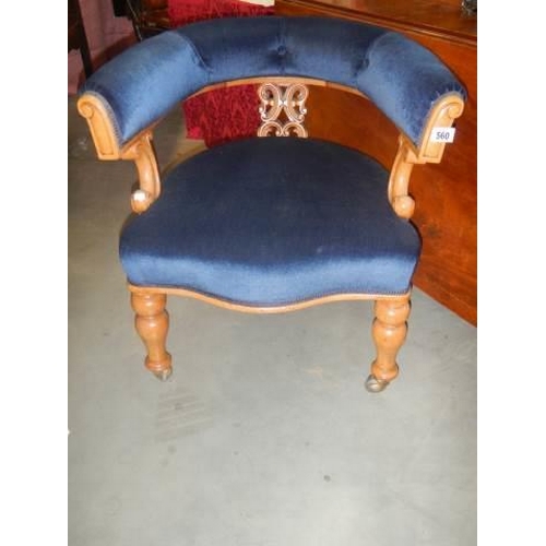 560 - A good old oak tub chair. COLLECT CHAIR.