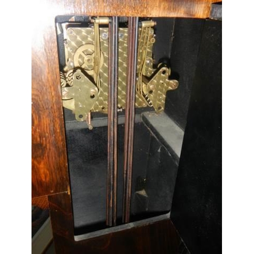 630 - An Edwardian oak Westminster chime Granddaughter clock (no key or pendulum). COLLECT ONLY.