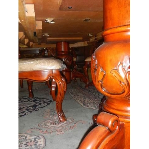 637 - A mahogany extending dining table with an extra lead and a set of 8 dining chairs, COLLECT ONLY.