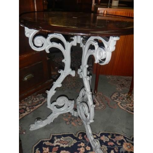 640 - A cast iron pub table with mahogany top, COLLECT ONLY.