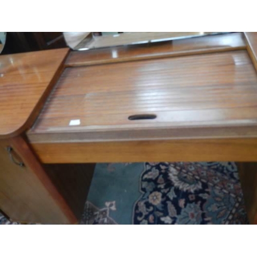 641 - A good retro dressing table with oval swivel mirror and sliding top, COLLECT ONLY.