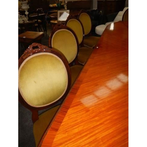 668 - A 10 foot French mahogany dining table with ten chairs, COLLECT ONLY.