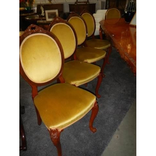 668 - A 10 foot French mahogany dining table with ten chairs, COLLECT ONLY.