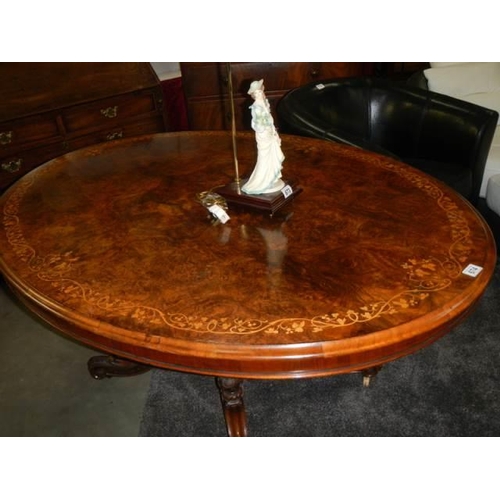 674 - A Victorian mahogany oval table on bird cage base with splay legs, COLLECT ONLY.