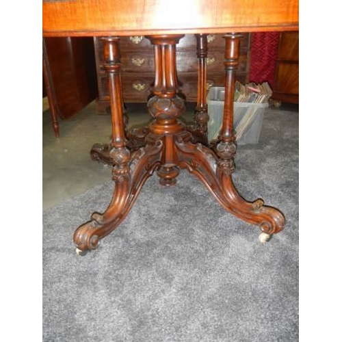 674 - A Victorian mahogany oval table on bird cage base with splay legs, COLLECT ONLY.