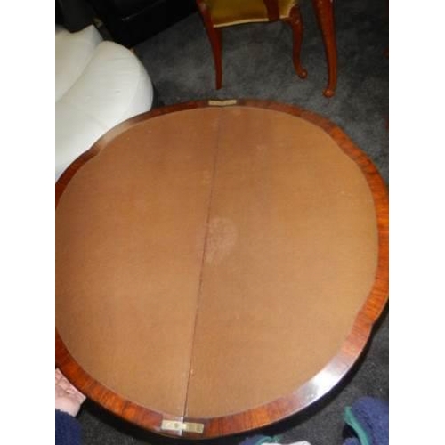 676 - A Victorian burr walnut fold over games table, COLLECT ONLY.