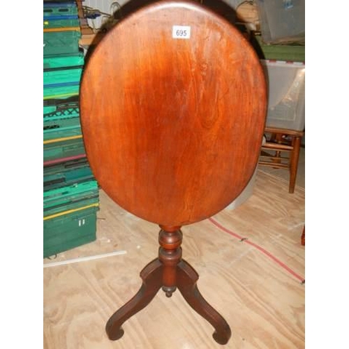 695 - A Victorian mahogany oval tip top table, COLLECT ONLY.