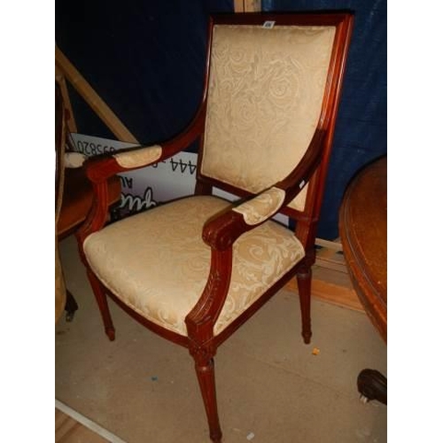 696 - A 20th century mahogany arm chair. COLLECT ONLY.