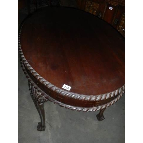 710 - A late Victorian oval mahogany table, COLLECT ONLY.