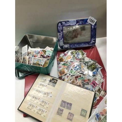 1080 - A box of assorted stamps in albums, loose and in envelopes.