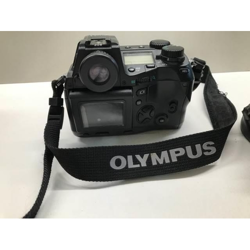 1081 - An Olympus digital camera with one extra lens and night vision scope (not tested).