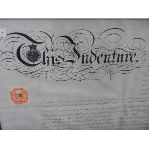 1566 - A framed and glazed indenture dated 1-7-1896, stamped and wax sealed, 76 x 56 cm, COLLECT ONLY.