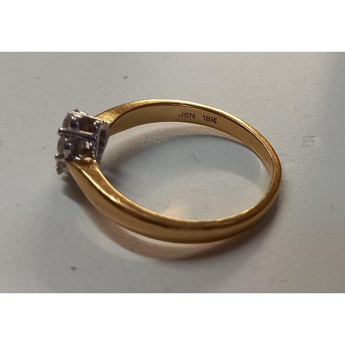 1060A - A diamond floral ring on 18ct gold (3.22g)