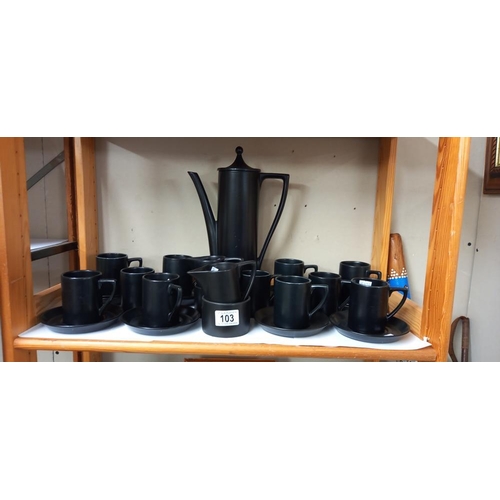 103 - A black porcelain coffee set COLLECT ONLY