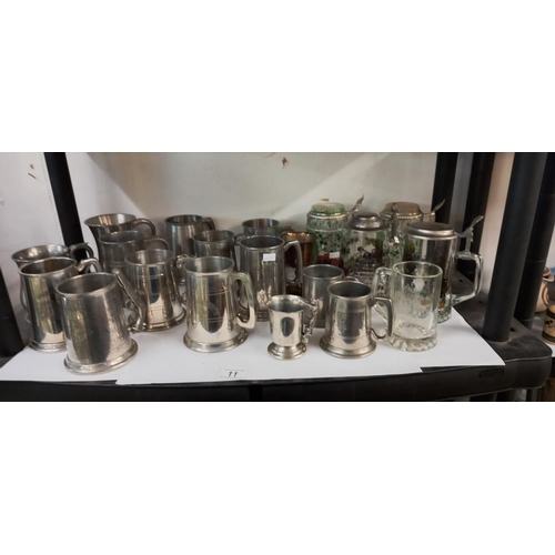 11 - A good lot of silver plate tankards etc including John Smiths, Samuel Smiths etc