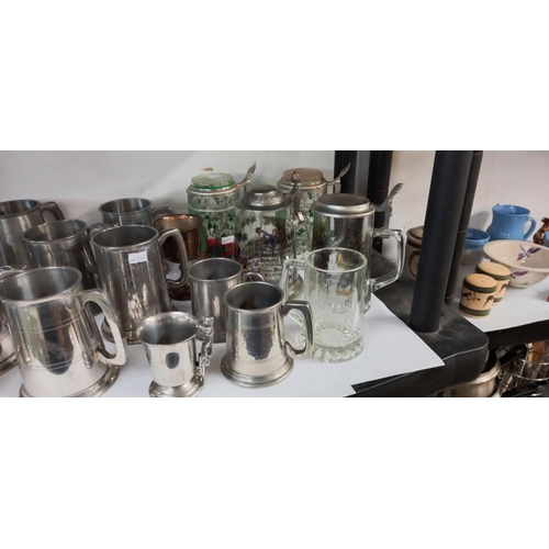 11 - A good lot of silver plate tankards etc including John Smiths, Samuel Smiths etc