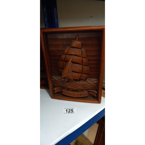 125 - A pair of wooden carved sailing ship design bookends