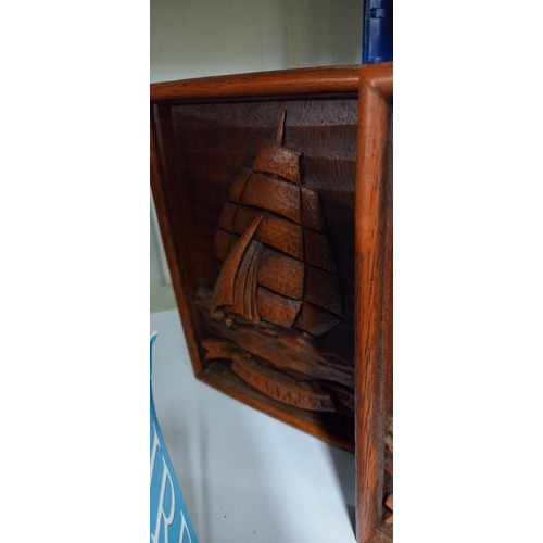 125 - A pair of wooden carved sailing ship design bookends