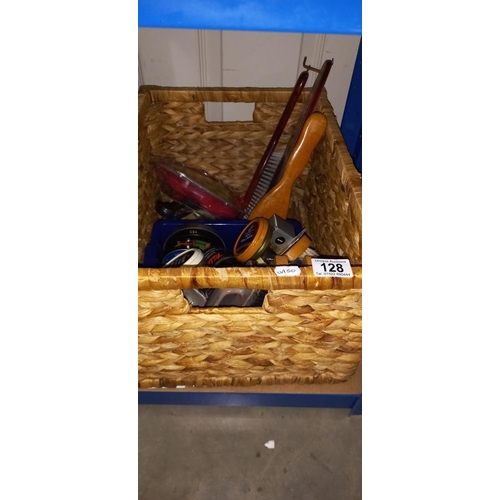 128 - A raffia box containing a quantity of shoe cleaning brushes/polishes and clothing brushes etc