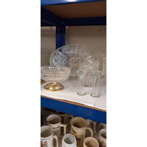 130 - A good lot of glassware including posy vases, nibble dishes etc