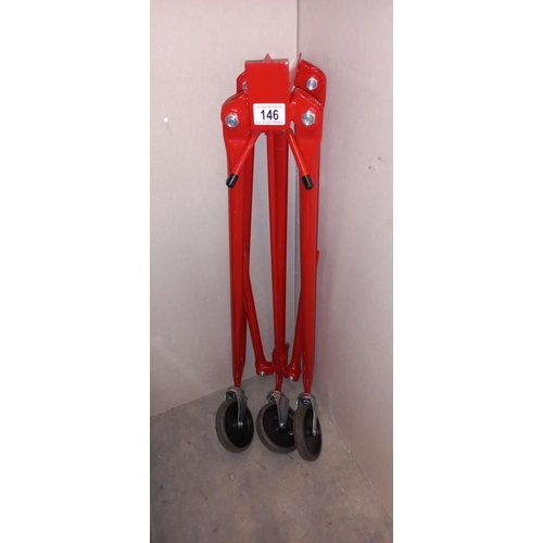 146 - A set of large folding trolley wheels approximate radius 80cm COLLECT ONLY