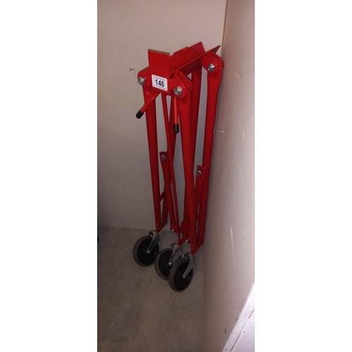 146 - A set of large folding trolley wheels approximate radius 80cm COLLECT ONLY