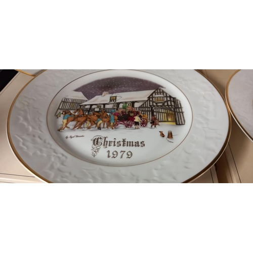 29 - 4 boxed Royal Worcester Christmas plates, 1979 through to 1982