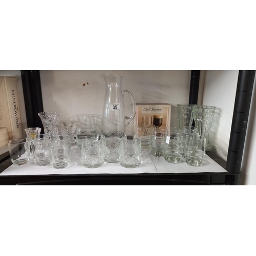 35 - A good lot of glassware including jug and sets of 6 glasses etc