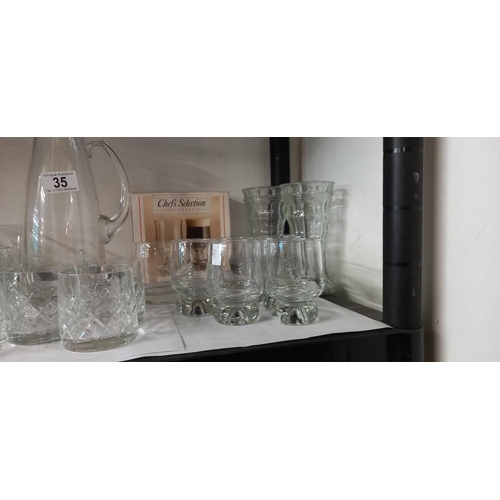 35 - A good lot of glassware including jug and sets of 6 glasses etc