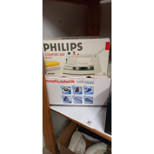 41 - Morphy Richards and Phillips irons, a tidy line retractable clothes line, grill and pudding steamer