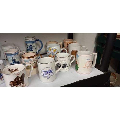 48 - A quantity of porcelain tankards etc