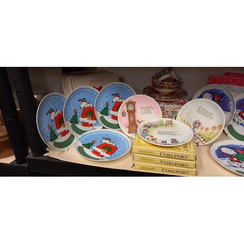 49 - A quantity (8) of Snoopy (Peanuts) Christmas plates, a Beano boxed breakfast set and 3 boxed nursery... 