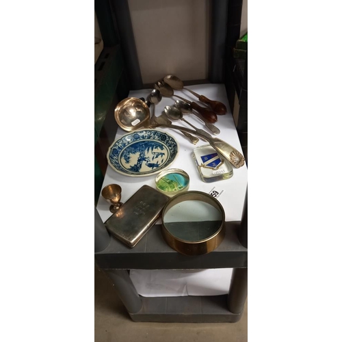 59 - A mixed lot including paperweights, large ladle etc