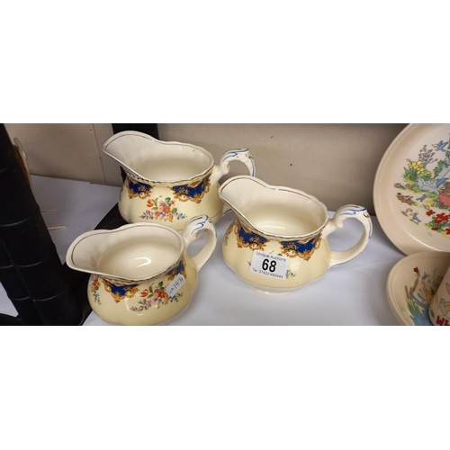 68 - 3 vintage graduated jugs by Grindley