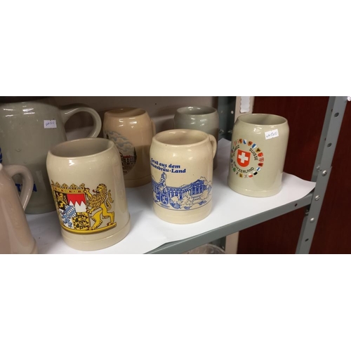 82 - A good lot of tankards including German examples