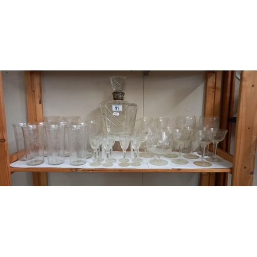 91 - A quantity of old drinking glasses and a decanter with silver neck, stopper is a/f