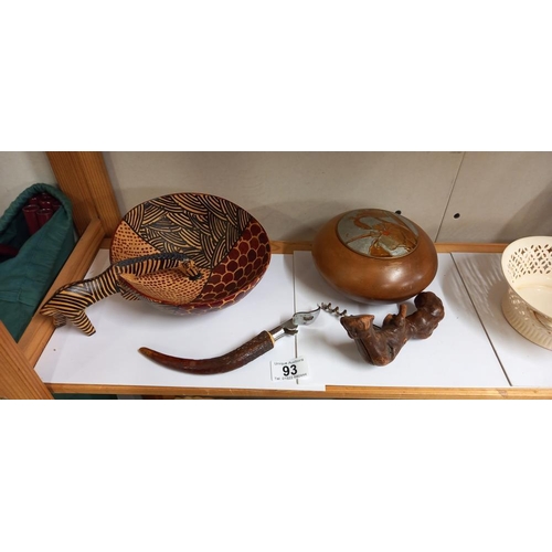 93 - A wooden handled cork screw and bottle opener, a lidded wooden bowl and a decorative wooden giraffe ... 