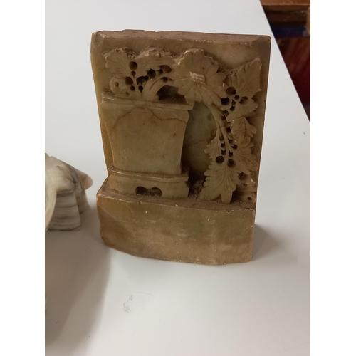 197 - A pair of alabaster bookends and an alabaster dish (chipped on edge)