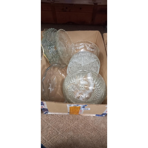 202 - 4 boxes of vintage glassware including cake stands, bowls etc