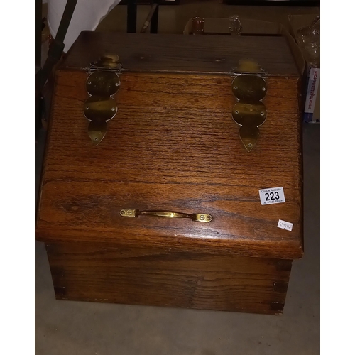 223 - A solid oak box with sloping front and brass hinges COLLECT ONLY