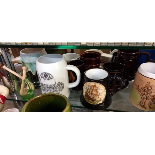 235 - A good lot of tankards etc COLLECT ONLY